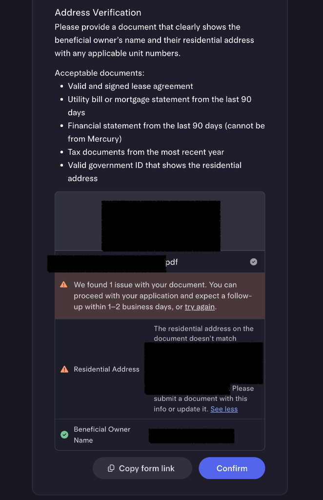 Address verification flagging a residential-address mismatch, with the option to proceed to human review